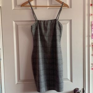 A grey and white patterned dress.